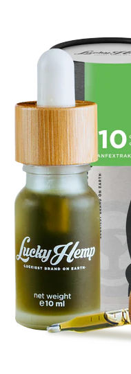 Flasche mit Tropfer für ein hochwertiges Öl, Holzdeckel, grünliche Flüssigkeit.